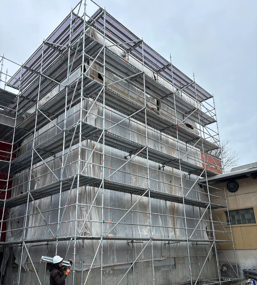 Custom steel scaffolding tower on a commercial job site